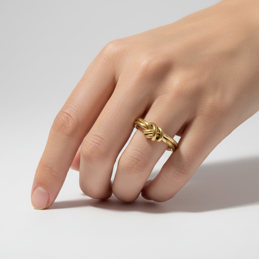 Unison Knoten Ring Gold